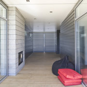 View of a covered pathway with decking and architecture, ceiling, daylighting, floor, house, interior design, real estate, window, white, gray