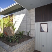 View of the exterior of this holiday home architecture, ceiling, daylighting, home, house, interior design, property, real estate, wall, window, wood, gray