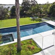 Exterior view of the rear of the renovated backyard, estate, grass, house, leisure, property, real estate, swimming pool, yard, white