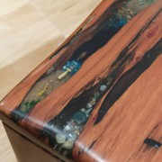 View of a table created by Ironwood Antique hardwood, wood, wood stain, red, orange