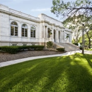 Exterior view of the Phillips Family Offices featuring architecture, building, campus, estate, facade, garden, grass, historic house, home, house, lawn, mansion, national trust for places of historic interest or natural beauty, official residence, plant, plantation, property, real estate, stately home, tree, brown, white