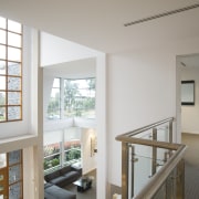 Interior view from the upper level of a architecture, daylighting, floor, handrail, home, house, interior design, living room, real estate, window, gray