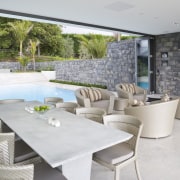 Image of stone walls which have been built chair, estate, house, interior design, property, real estate, table, white