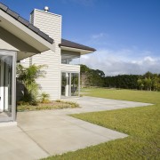 Image of coloured concrete from Peter Fell Ltd estate, facade, grass, home, house, landscape, lawn, property, real estate, residential area, sky, villa, brown, gray