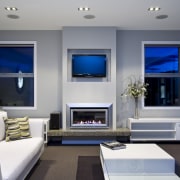 View of a living room which features a home, interior design, living room, room, wall, window, gray