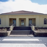 Exterior view of the observatory which features steel building, estate, facade, home, house, mansion, property, real estate, residential area, white, gray