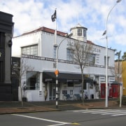 Exterior view of post office building prior to architecture, building, car, city, commercial building, downtown, facade, house, mixed use, neighbourhood, real estate, residential area, street, white, black