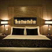 View of bedroom whch features the Illuminations electric bed, bed frame, bedroom, ceiling, furniture, interior design, light fixture, lighting, room, suite, wall, brown