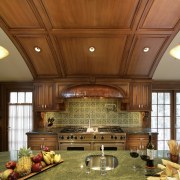 view of a renovated kitchen with a classical cabinetry, ceiling, countertop, cuisine classique, estate, hardwood, home, interior design, kitchen, lighting, living room, real estate, under cabinet lighting, wood, brown