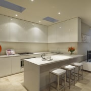 View of kitchen area featuring CaesarStone benchtops, recessed ceiling, countertop, interior design, kitchen, real estate, room, brown, orange