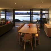 View of the open-plan living and dining area apartment, interior design, real estate, room, table, brown