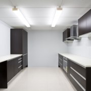 View of a kitchen which features products available architecture, cabinetry, ceiling, countertop, daylighting, floor, interior design, kitchen, office, product design, room, white, black