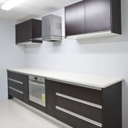 View of a kitchen which features products available cabinetry, countertop, floor, furniture, interior design, kitchen, product design, white