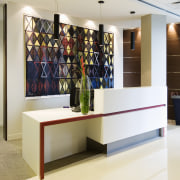 view of the reception area with tiled flooring, furniture, interior design, product design, shelf, shelving, table, white