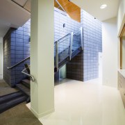 View of a stairway with glass balustrade and architecture, ceiling, daylighting, floor, flooring, interior design, lobby, real estate, stairs, white, gray