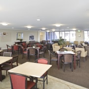 Interior view of one of Summerset's communal areas cafeteria, function hall, restaurant, table, white, gray