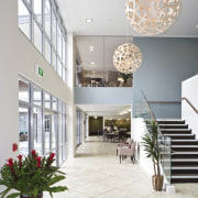 View of the main foyer at Summerset by ceiling, daylighting, floor, flooring, home, interior design, lobby, white