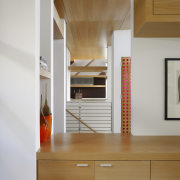 View of timber cabinetry with a stairway in cabinetry, floor, flooring, furniture, hardwood, interior design, room, wood, gray, brown