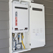 View of gas hot water system by Rinnai electrical wiring, product, product design, gray, white