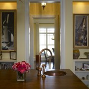 View of kitchen featuring a central island with ceiling, dining room, floor, flooring, furniture, hardwood, home, interior design, living room, room, table, wall, window, wood, wood flooring, brown