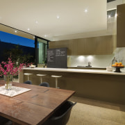 View of open-plan kitchen and dining area which architecture, countertop, interior design, kitchen, real estate, room, brown, orange