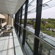 Interior view of the Lucient Apartments which features architecture, building, daylighting, glass, window, gray