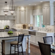 View of a kitchen which features a square cabinetry, countertop, cuisine classique, dining room, home, interior design, kitchen, room, gray