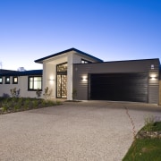 Exterior view of a David Reid Homes show architecture, building, elevation, estate, facade, home, house, property, real estate, residential area, sky, teal