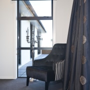 View of one of the DRH show home chair, curtain, floor, furniture, home, house, interior design, room, table, textile, window, window treatment, black, white