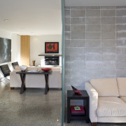 View of living room which features a furnishings, architecture, door, floor, flooring, house, interior design, living room, property, real estate, room, wall, window, gray