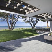 View of a large patio of this home architecture, estate, home, house, interior design, property, real estate, gray, black