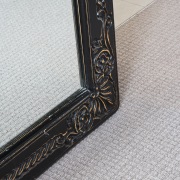 View of a bedroom area which features pure floor, flooring, wood, gray