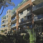 Exterior view of the Lindfield Apartments which were apartment, building, condominium, facade, home, hotel, house, mixed use, neighbourhood, property, real estate, residential area, resort, black