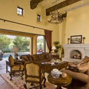Interior view of the living area which features estate, interior design, living room, property, real estate, room, orange, brown