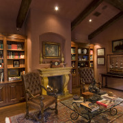 Interior view of the library which features exposed estate, furniture, home, interior design, living room, room, brown, red