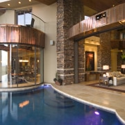 Interior view of the pool area with tiling, estate, home, interior design, lobby, property, real estate, swimming pool, brown