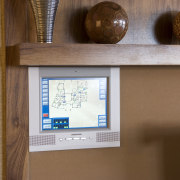View of a touch screen electronic control system furniture, wood, brown