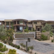 Exterior view of a house which was designed estate, facade, home, house, mansion, neighbourhood, property, real estate, residential area, villa, white, brown