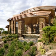 Exterior view of the Sun West Custom Home arecales, estate, hacienda, home, landscape, landscaping, outdoor structure, palm tree, plant, real estate, brown, white