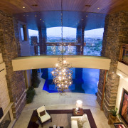 View of the living area which features a architecture, ceiling, estate, home, house, interior design, lighting, living room, lobby, room, brown