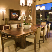 View of the dining area of this home chair, dining room, furniture, interior design, room, table, brown, orange