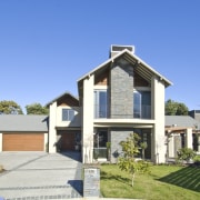 Exterior view of a home constructed by Walmsley building, cottage, elevation, estate, facade, farmhouse, home, house, property, real estate, residential area, siding, villa, teal