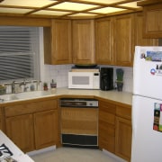 View of the kitchen prior to renovations. - cabinetry, countertop, kitchen, room, brown