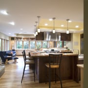 View of a kitchen which features a L-shaped ceiling, dining room, furniture, interior design, kitchen, room, table, gray, brown