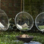 View of a landscaped garden which features three flora, grass, leaf, plant, tree, brown