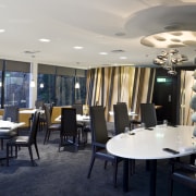 View of the main dining area of a furniture, interior design, restaurant, table, gray