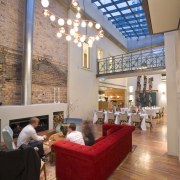 View of the atrium with pieces of red ceiling, interior design, living room, lobby, real estate