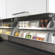 View of custom storage solutions available from Hettitch. furniture, product, product design, shelf, shelving, white, black