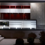View of an Apollo Kitchens showroom which showcases cabinetry, furniture, interior design, black
