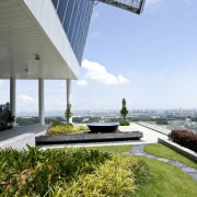 Exterior view of one of the sky gardens architecture, condominium, grass, real estate, sky, water, white
